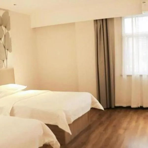 GreenTree Inn Shanxi Luliang Fengshan Road Central Park Express Hotel, hôtel à Luliang