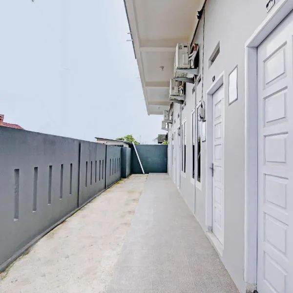 Hotel O Lavina Guesthouse, hótel í Dumai
