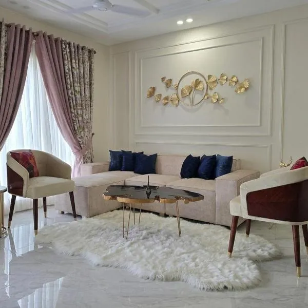 Ismails cottage 2BR apartment, hotel en Faisalabad