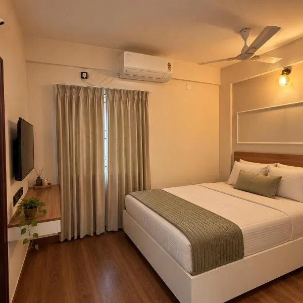 Petals Suites & Hotel - Manyata Tech Park, hotell i Bangalore