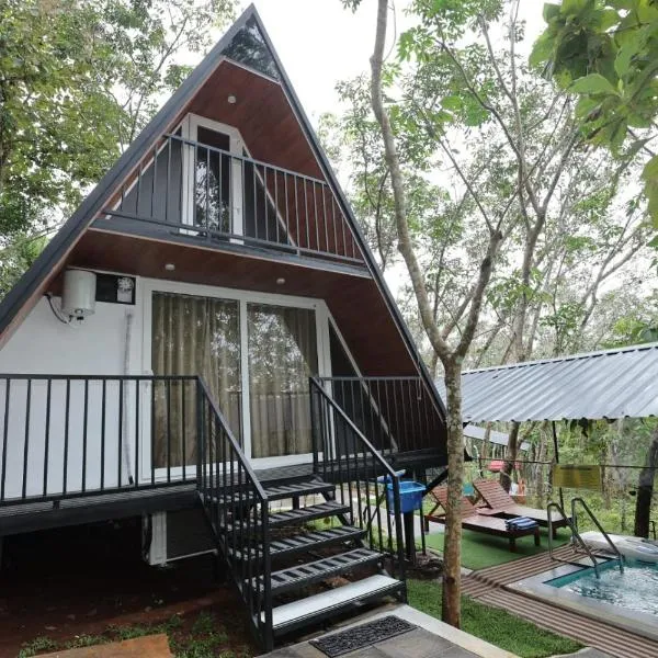 Nambeesans Farm House, hotel em Nīleswaram