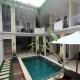 Tom Guest House Legian - Fotografie 1