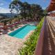 Hotel Recanto São Cristóvão - Próximo ao Parque Tarundu, カンポス・ド・ジョルドン - 写真 1