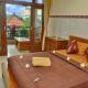 Mira Family Homestay Ubud - Photo 1