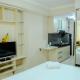 Minimalist Studio Room at Grand Serpong Apartment By Travelio Tangerang - Photo 8