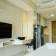Sophisticated Studio at The Oasis Apartment By Travelio Cikarang - Fotografie 3