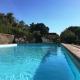 Casa Bianca Villa pool with sea view, fenced garden, barbecue by ToscanaTour, Castellina Marittima