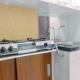 Compact Studio Room at Tamansari Papilio Apartment By Travelio Surabaya - Photo 4