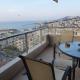 Christos house-- Comfortable apartment with great view and private parking !