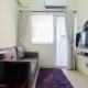 Tranquil 2BR @ Green Pramuka Apartment By Travelio