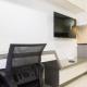 1BR with Working Space The Oasis Cikarang By Travelio - Fotografie 3