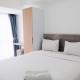 Comfy Studio at M-Town Gading Serpong Apartment By Travelio Tangerang - Photo 1