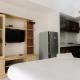 Comfortable and Spacious Studio Casa De Parco Apartment By Travelio, Tangerang - Fotografie 2