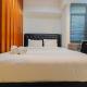 Elegant 1BR at Grand Kamala Lagoon Apartment By Travelio, Pekayon Satu