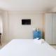 Cozy Studio with City View at Elvis Tower Apartment By Travelio Cikarang - Fotografie 4