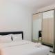 Brand New Cozy Studio at Scientia Apartment By Travelio