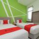 RedDoorz Plus at Grand Tara Homestay Palembang - Fotografie 3