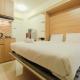Modern Studio Apartment at 26th Floor Green Pramuka City By Travelio Giacarta - Foto 1