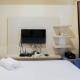 Elegant Studio Apartment at Tamansari Papilio By Travelio Surabaya - Photo 3