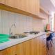 Warm Design Studio Apartment at Casa De Parco By Travelio Tangerang - Fotografie 5