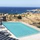 modern apartment with a sea view and swimming pool in Koundouros - Fotografie 2