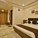 Hotel Kamran Palace, Ahmedabad - Foto 1