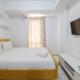 Minimalist Studio at Azalea Suites Cikarang Apartment By Travelio - Foto 2