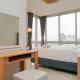 Relaxing 2BR at The Empyreal Condominium Epicentrum Apartment By Travelio Jakarta - Fotografie 9