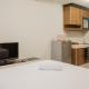 Comfy and Minimalist Studio Apartment Scientia Residence Tower B By Travelio, Tangerang - Fotografie 3