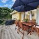 Surfer's Sunshine Cottage - Piha Holiday Home