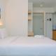 Simple Studio Apartment at Grand Kamala Lagoon By Travelio Bekasi - Foto 3