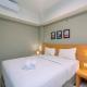 Luxury 1BR Apartment with Golf View at Mustika Golf Residence By Travelio, Cikarang (fotografie 4)