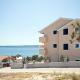Seaside apartments with a swimming pool Posedarje, Novigrad - 6162, Posedarje (fotografie 9)