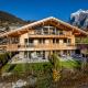 Chalet CARVE - Apartments EIGER, MOENCH and JUNGFRAU Grindelwald - Fotografie 1