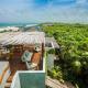 luxury beachfront villa in Sian Kaan, Tulum (Foto 10)