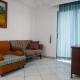 Spacious Classic 1BR Apartment at Taman Beverly By Travelio, Putat-gede (foto 4)