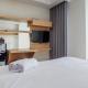 Spacious Studio Room Apartment at Grand Sungkono Lagoon By Travelio, Dukuhpakis - Fotografie 4
