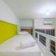 Cozy Studio with Bunk Bed at Dave Apartment near UI By Travelio Pondoktjing Dua - Foto 2