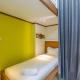 Cozy Studio with Bunk Bed at Dave Apartment near UI By Travelio Pondoktjing Dua - Foto 10