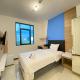 Smart Studio Room Semi Apartment at The Lodge Paskal near BINUS University By Travelio