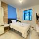 Simply Studio Room Semi Apartment at The Lodge Paskal near BINUS University By Travelio