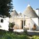 Trulli sul vignale in Masseria Santalachicca Martina Franca - Fotografie 1
