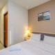 Modern and Spacious Studio with City View @ Grand Kamala Lagoon Apartment By Travelio, Pekayon Satu - Foto 10