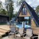 Widgeon Bespoke Cabin is lakeside with Private fishing peg, hot tub situated at Tattershall Lakes Country Park