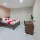 RedDoorz Plus at Pelita Guest House Balikpapan - Fotografie 1