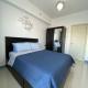 A Cozy 2 Bedroom Unit with a Parking at Tower 2 South Residences SM Southmall, Manila - Photo 1