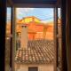 Casa Veronica - accogliente casa su due piani nel cuore del borgo, Làconi (Foto 3)