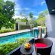 The aristo-access pool room Surin beach, Phuket - Fotografie 1