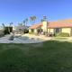 NEW Desert Oasis!! 3 Bedrooms, 1 Studio, 2 1/2 Bathrooms, Pool, Spa and Gorgeous backyard!!