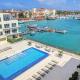 Stylish luxury condo, central location, ocean view, pool, gym Oranjestad - Foto 5